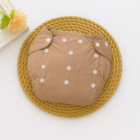 Couche d’Apprentissage Réutilisable et Imperméable (Série Couleur Unie) – Par Coucheco